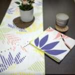 Pollen up design Dinner Napkin in yellow with pastels table runner LS from hem and tassel