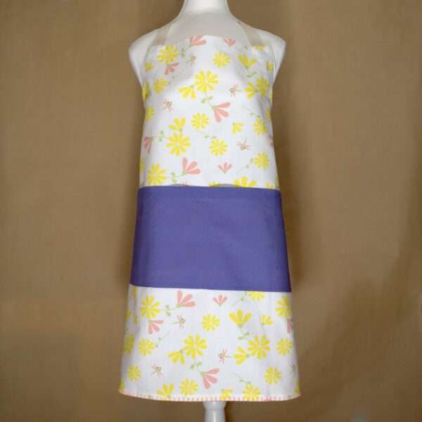Shy dragonflies design apron with yellow flowers on mannequin from hem and tassel