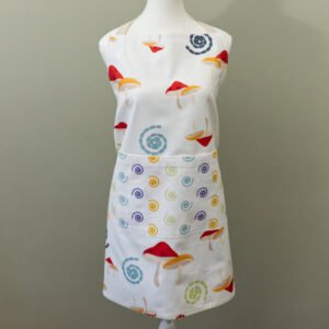 apron on mannequin in magic and mushroom design