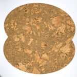 graphic oval design cork set of two placemats fanned out from hem and tassel