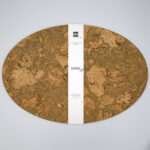 graphic oval design cork set of two placemats with bandroll from hem and tassel