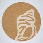 home by the sea design cork placemat with seashell print from hem and tassel