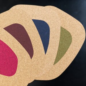 kidney bean cork mats in four colors fanned out from top