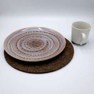 matt black design cork placemat with plate and miug from hem and tassel