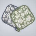 monster ah design pot holders fanned out. kitchen accessories from hem and tassel