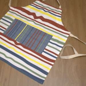 not straight design apron in bold-broad stripes flat from hem and tassel