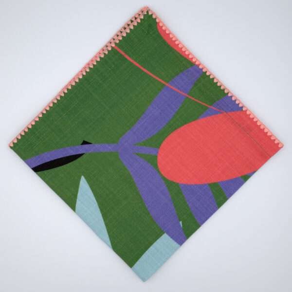 pollen up pink flower design dinner napkin in pink flat folded from hem and tassel