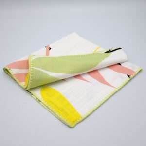 pollen up purple flower design dinner napkin in yellow folded from hem and tassel