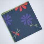 shy dragonfly design dinner napkin in oil flat folded from hem and tassel