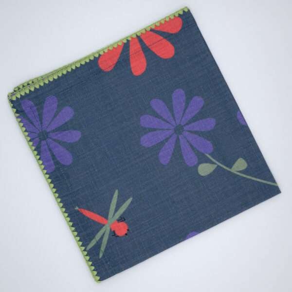 shy dragonfly design dinner napkin in oil flat folded from hem and tassel