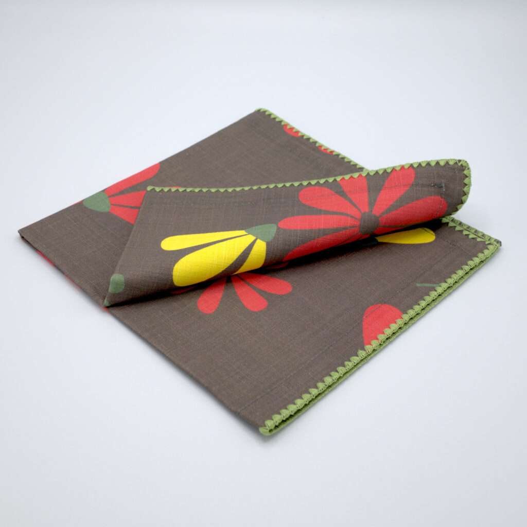 hiding shy dragonfly design dinner napkin in winter folded from hem and tassel