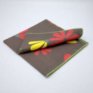 hiding shy dragonfly design dinner napkin in winter folded from hem and tassel