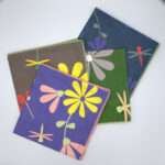 shy dragonfly design four dinner napkins fanned from hem and tassel