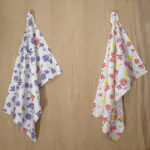 shy dragonfly design two hanging tea towels with pink from hem and tassel