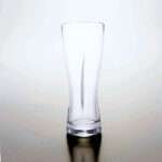 Ridged slash pilsner beer glass made in japan from hem and tassel, shown empty