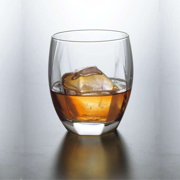 old fashioned whiskey glass with multiple facets showing clarity of glass, made in japan from hem and tassel