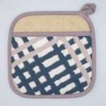 jute impossible design pocketed pot holder in slate from hem and tassel