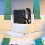 Showing convenient inner pocket of canvas shopping tote bag