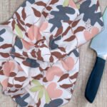 Just leaves towel oil oak on counter with olives from hem and tassel