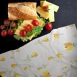 Lip TuLip tea towel with sub sandwich from hem and tassel