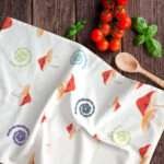 Magic mushroom towels on kitchen counter with tomatoes and basil from hem and tassel