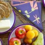 shy dragonfly dinner napkin with breakfast on table from hem and tassel
