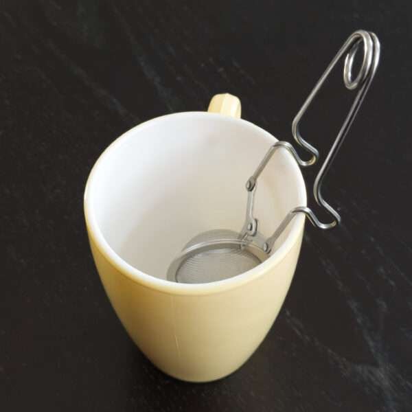 Clip style ball tea infuser inside icon mug yellow by dte from hem and tassel