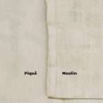Close up of pique and muslin fabricsfrom hem and tassel