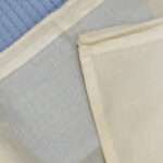 Close up of ultra fine fabric of lightweight produce bag fabricsfrom hem and tassel