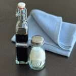 Salt & Vinegar in theeir respective recycled glass containers by dte from hem and tassel