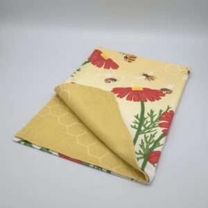 bees and flowers design towel folded front view by DTE from Hem And Tassel
