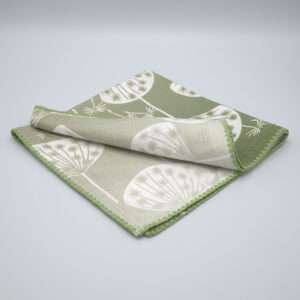 dandelions design dinner napkin green folded by DTE from Hem And Tassel