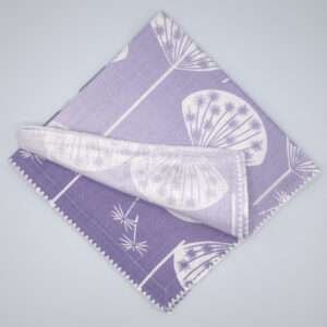 dandelions design dinner napkin top view by DTE from Hem And Tassel