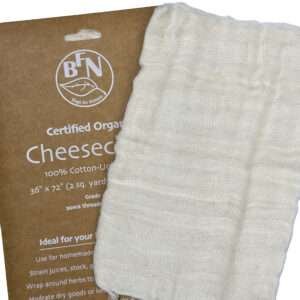 one pack of organic cotton Cheesecloth and cheesecloth fabric shown unpackedfrom hem and tassel
