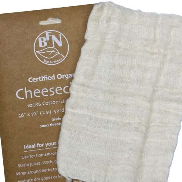 one pack of organic cotton Cheesecloth and cheesecloth fabric shown unpackedfrom hem and tassel