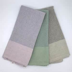 stonewashed towels in 3 colors folded and cascaded by DTE from Hem And Tassel