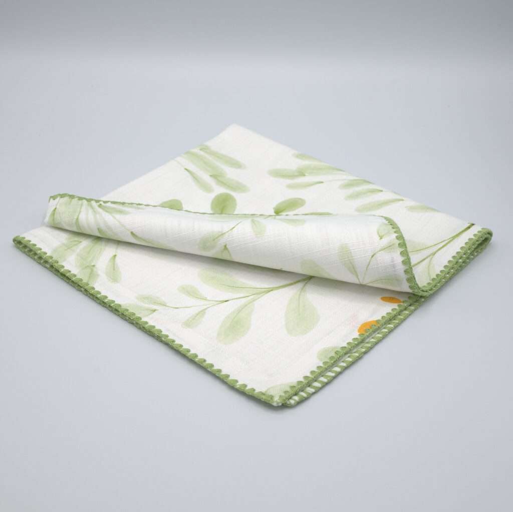 watercolors design dinner napkin folded by DTE from Hem And Tassel
